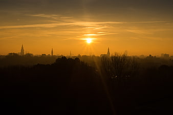 Golden Sunrise Over Groningen City Skyline Silhouette