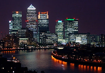 London Canary Wharf Skyline at Night with River Reflections