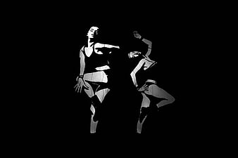 Silhouette of Two Women Dancing in Black and White