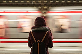 Woman Waiting for Subway Train with Motion Blur