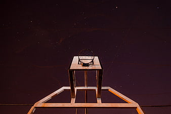 Low angle view of basketball hoop against starry night sky