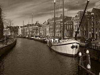 Vintage Black and White Photo of Canal Boats in Amsterdam
