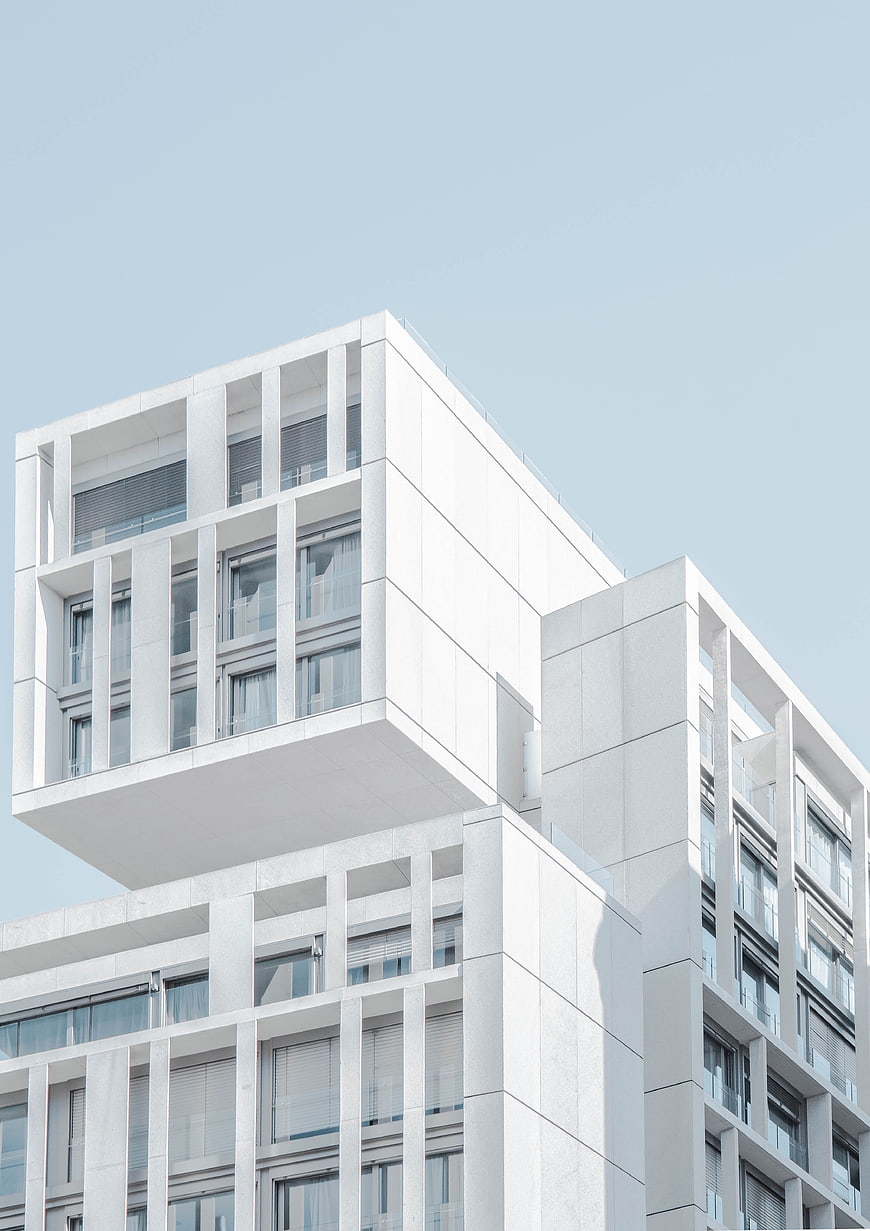 Modern white minimalist architecture against blue sky