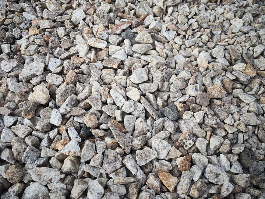 Close-up texture of gray and brown gravel stones