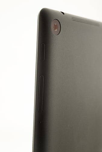 Close-up of black tablet back with camera lens