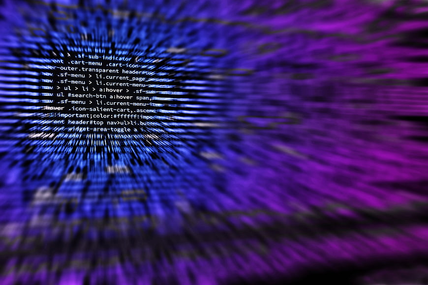 Abstract digital code background with blue and purple motion blur