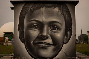 Realistic Black and White Street Art Portrait of a Boy