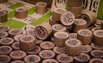 Close-up of wooden bingo chips on a game board