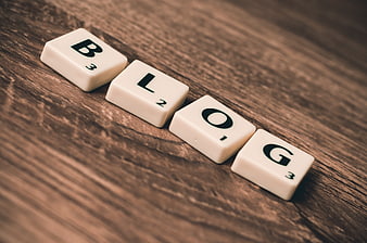 Scrabble Tiles Spelling Blog on Wooden Background