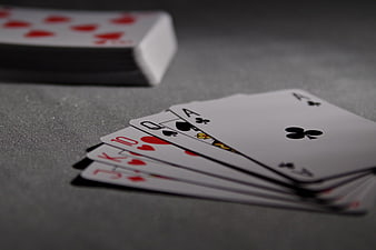 Royal Flush Playing Cards on Gray Table
