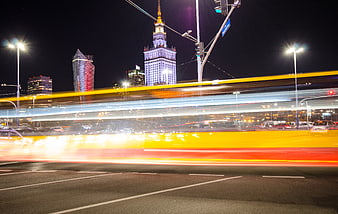 Long Exposure Traffic Light Trails in Warsaw Cityscape at Night