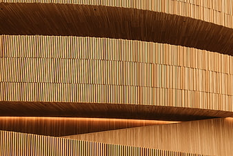 Modern wooden slat wall with curved architectural details