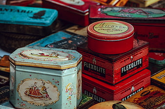 Vintage tin boxes with retro labels and colorful designs