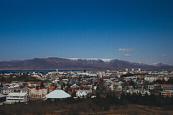 Aerial View of Akureyri, Iceland with Snow-Capped Mountains