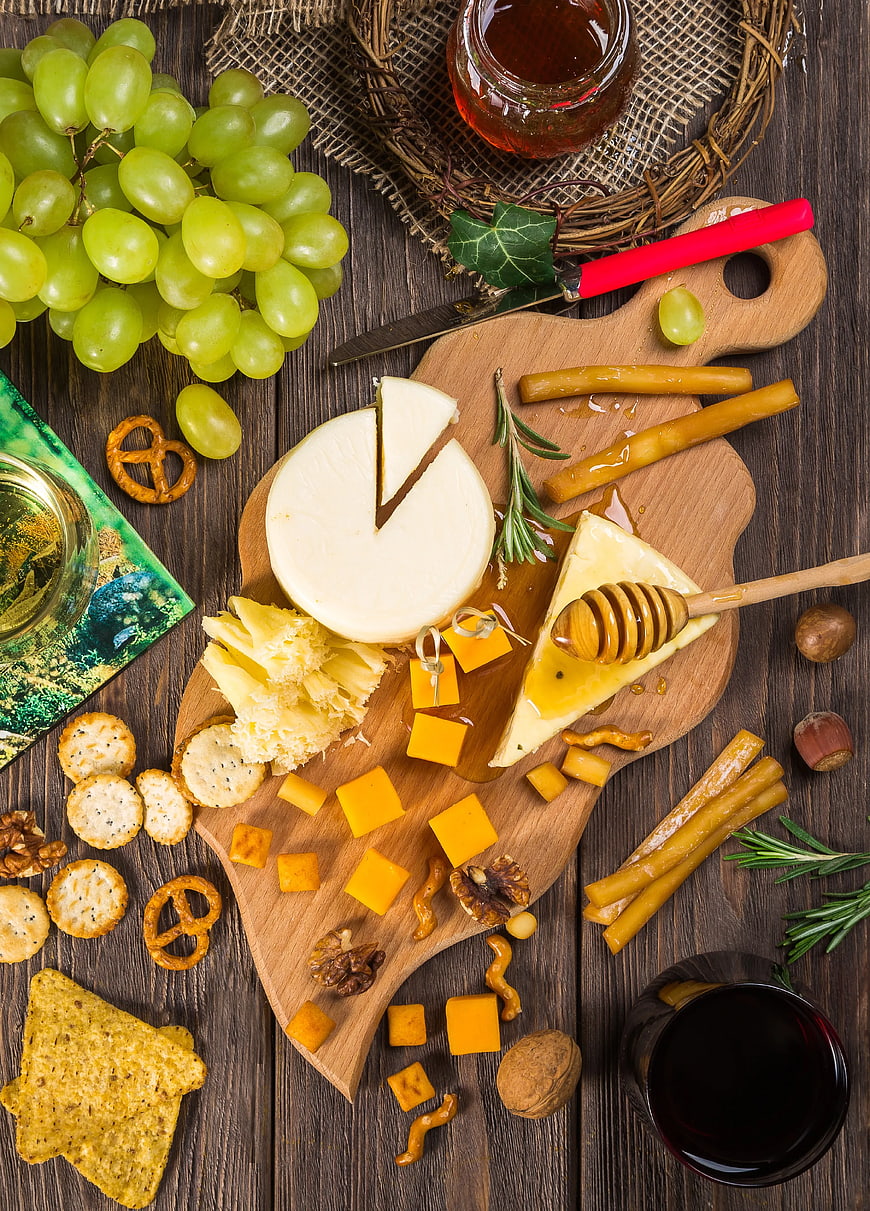 Rustic Cheese Board with Grapes, Honey, and Wine