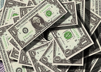 Scattered One Dollar Bills with Dramatic Shadows