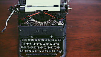Vintage L.C. Smith Typewriter on Wooden Desk
