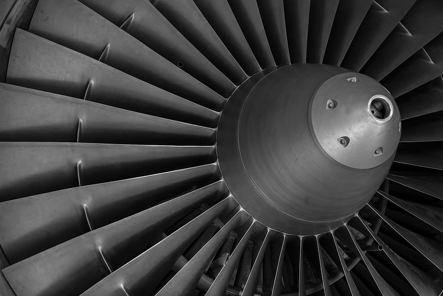 Close-up of a jet engine turbine fan blades