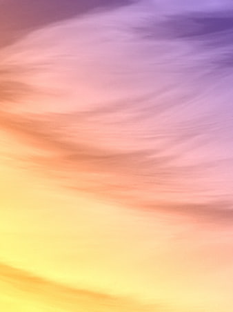 Abstract pastel sky gradient background with pink, purple, and yellow hues