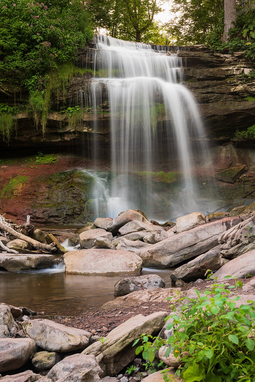 Serene Forest Waterfall with Smooth Flowing Water