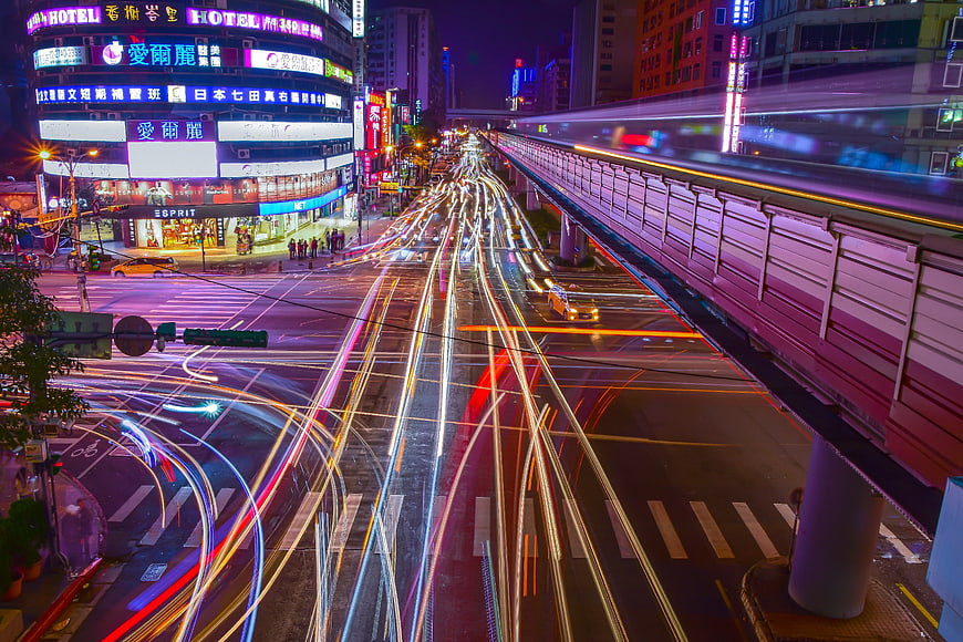 Long Exposure Light Trails on Busy City Street at Night
