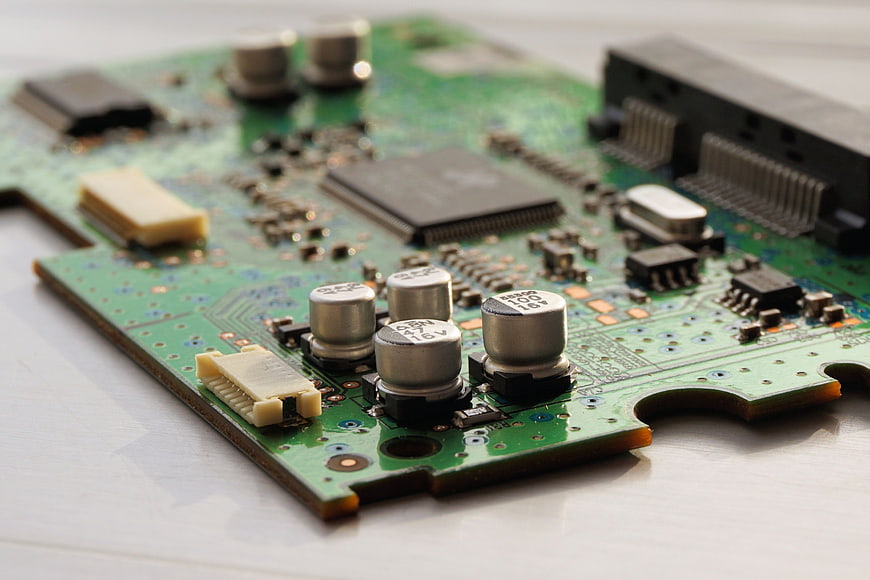 Close-up of green computer motherboard circuit board