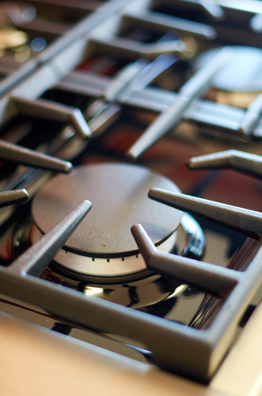 Close-up of modern gas stove burner and grates