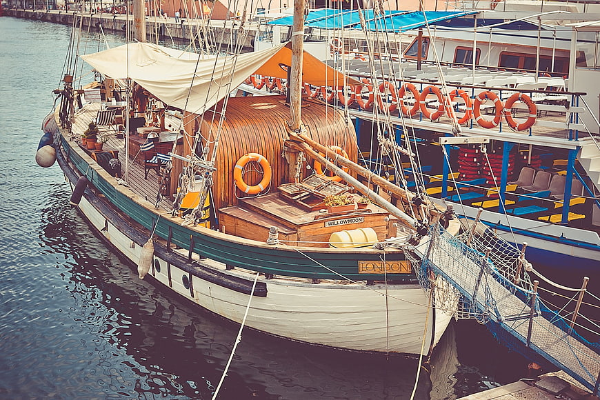 Vintage Wooden Sailboat Willowmoor Docked in Harbor