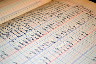 Close-up of Handwritten Ledger with Financial Records