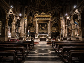 Grand Catholic Cathedral Interior with Ornate Altar and Pews