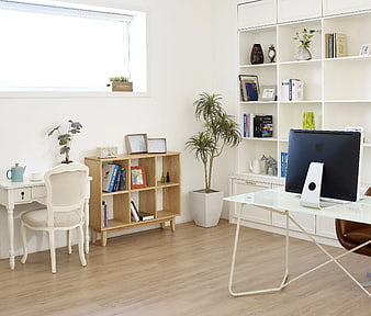 Bright modern home office with wooden furniture and white desk