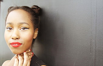 Portrait of Young Black Woman with Red Lipstick and French Manicure