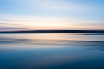 Abstract Long Exposure Sunset Over Calm Water