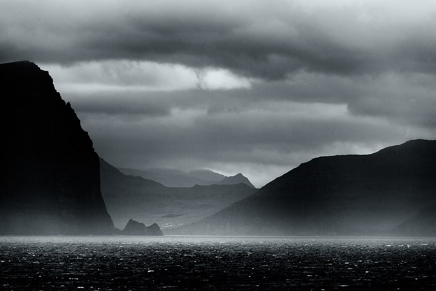 Moody Black and White Mountain Landscape with Misty Lake