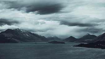 Dramatic Lake Wakatipu Landscape with Snowy Mountains