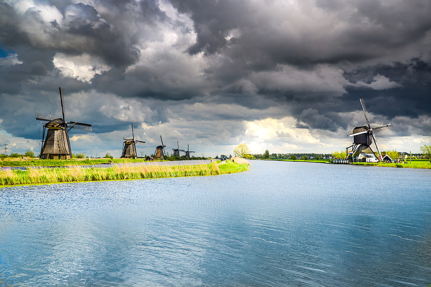 Dramatic cloudy sky over Kinderdijk windmills in the Netherlands