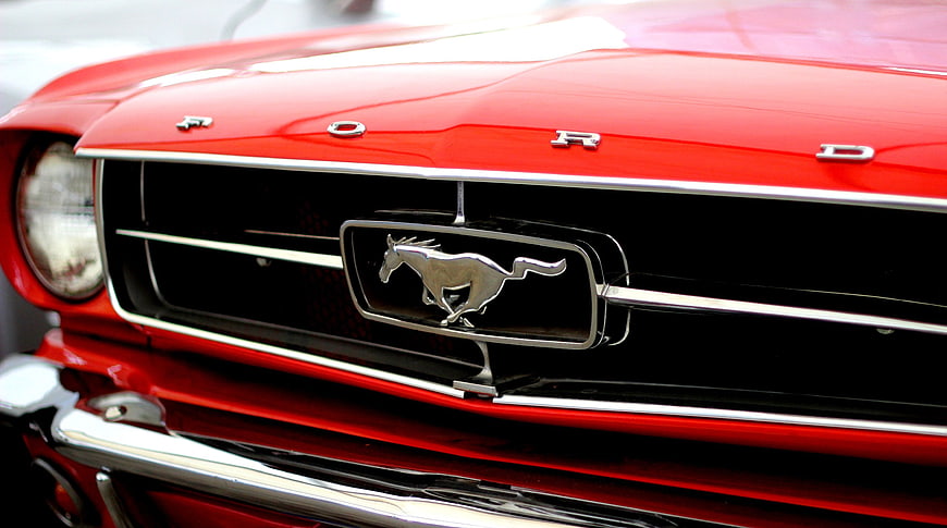 Close-up of Classic Red Ford Mustang Front Grille