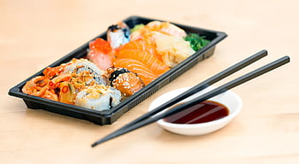 Sushi Bento Box with Chopsticks and Soy Sauce