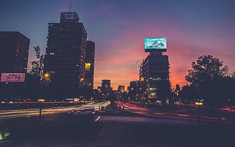 City Skyline at Dusk with Long Exposure Traffic Light Trails