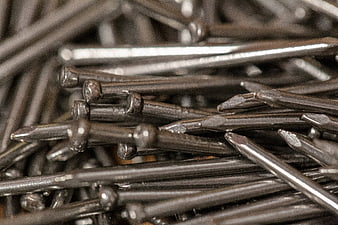 Close-up of shiny steel nails for construction and carpentry