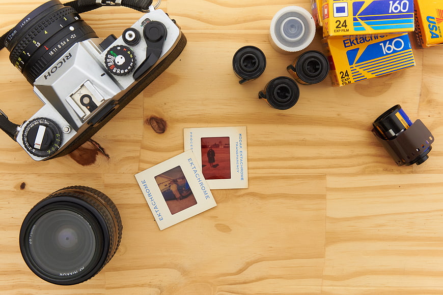 Vintage Film Photography Equipment Flat Lay on Wooden Table