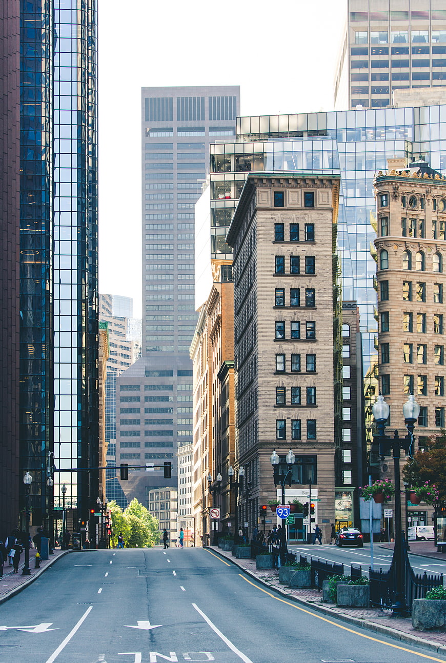 Urban Street View with Skyscrapers and Historic Architecture
