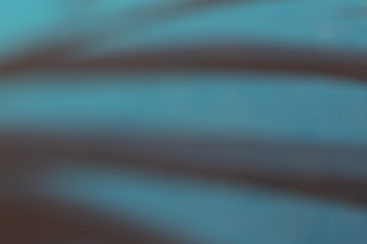 Abstract Blurred Teal and Brown Gradient Background