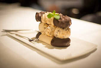 Gourmet Chocolate and Vanilla Ice Cream Dessert on White Plate