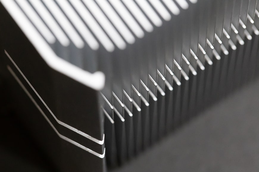 Close-up of black aluminum heat sink fins