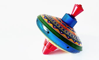 Colorful Vintage Spinning Top Toy on White Background