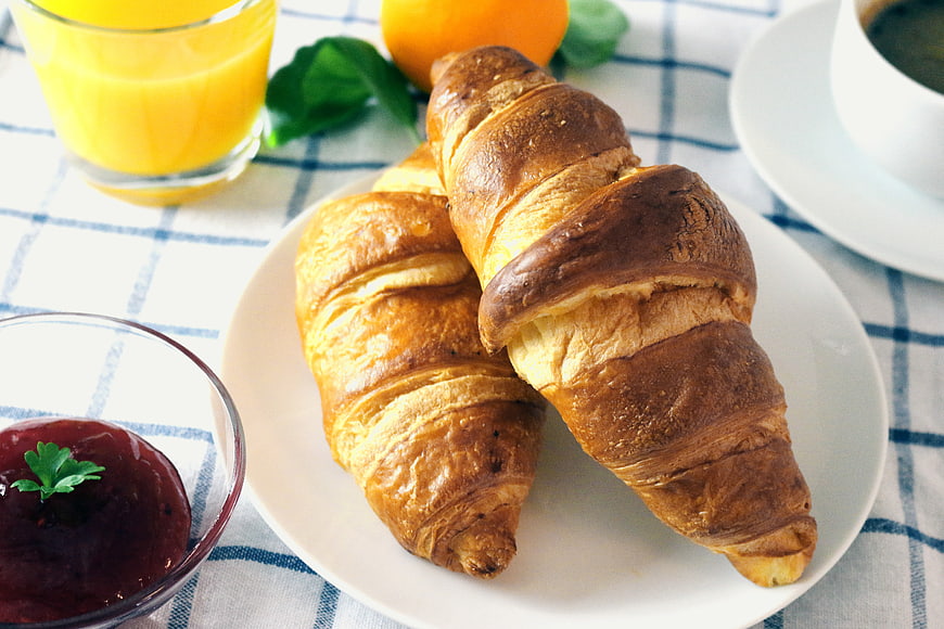 Fresh Croissants with Jam and Orange Juice Breakfast