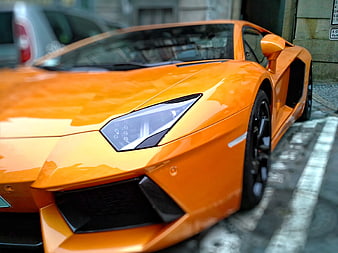 Close-up of Orange Lamborghini Gallardo Parked on Street