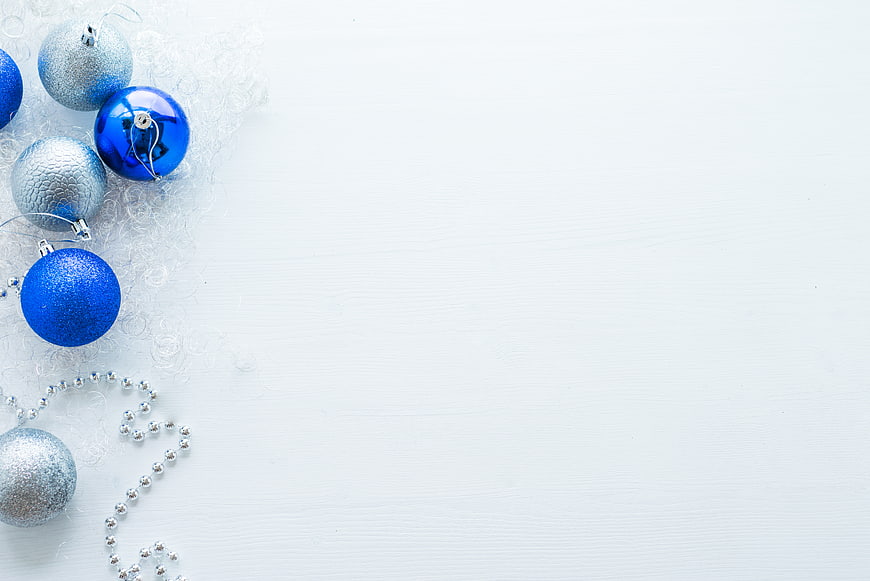 Blue and Silver Christmas Ornaments on White Background