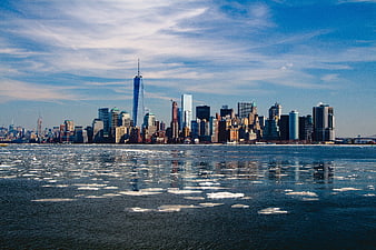 New York City skyline with ice floes in winter